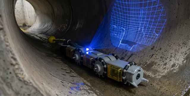 The PipeRover crawler scanning the inside of a large pipe with structured light
